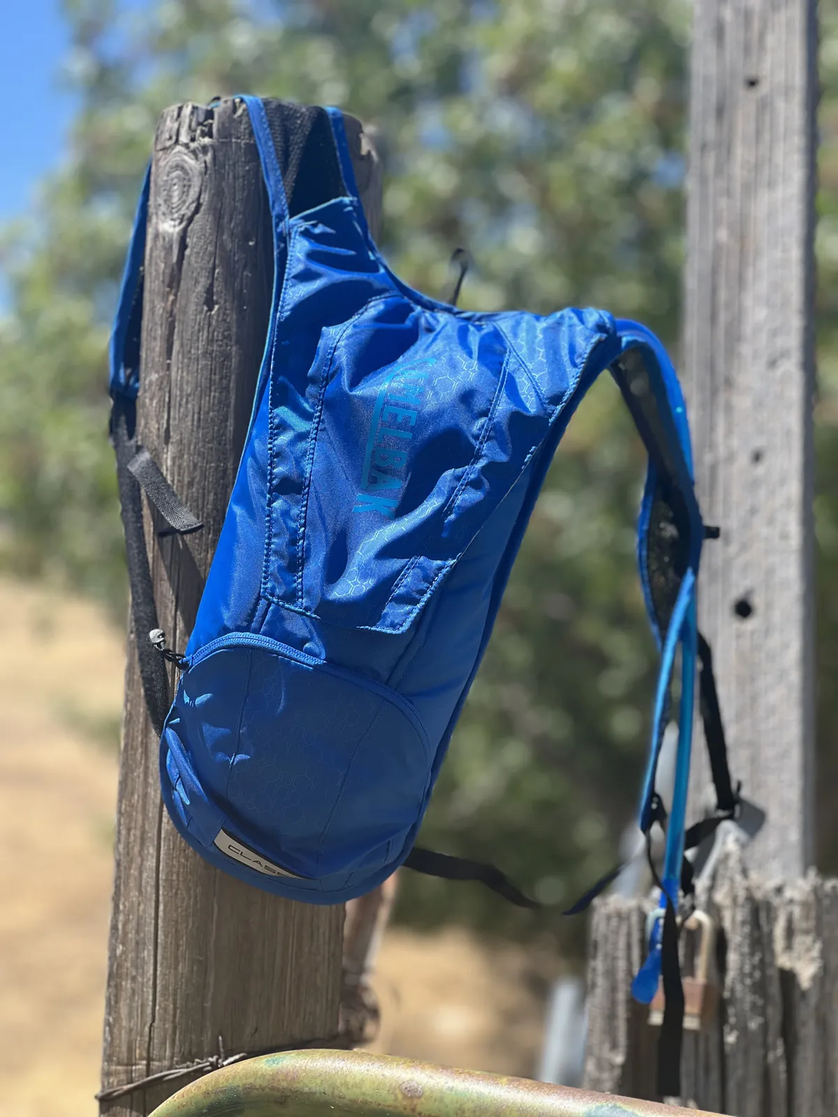 Gen X UGC creator's lifestyle product shot of a durable CamelBak water bottle for an active outdoor portfolio.